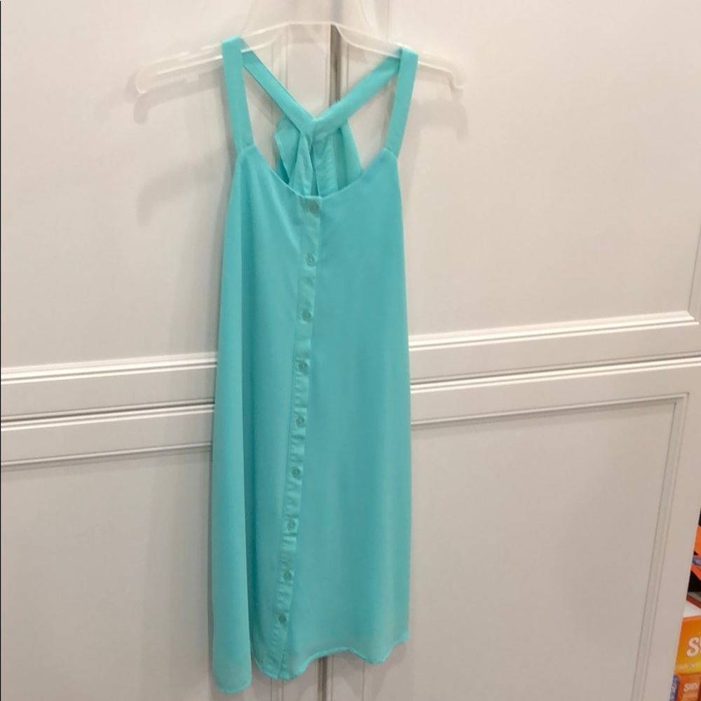 Sleeveless sea foam green button front dress